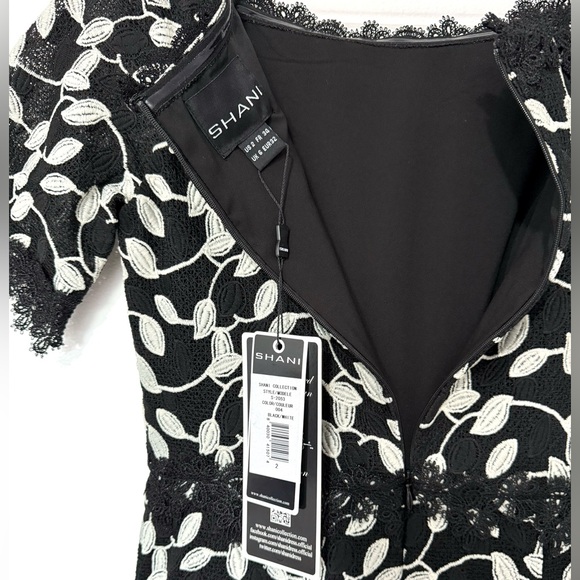Shani NWT Black/White Two Tone Lace Bateau Neck Ruffle Hem Dress - Picture 5 of 10